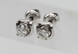 A pair diamond stud earrings (not hallmarked).