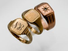 Three 9ct gold gents signet rings, approx 10.6g.