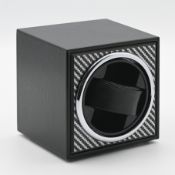 A Kinetic watch winder, cased.