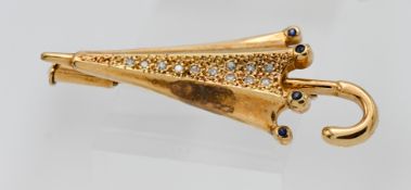 An umbrella brooch set in 18ct yellow gold with diamonds and sapphires, 5.30g.