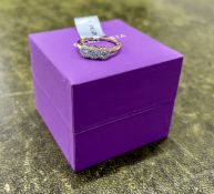 Gemporia, a 9k Blue Lagoon white diamond ring, size Q, with authenticity certificate.