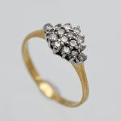 An 18ct diamond ring, set5 with sixteen modern brilliant stones, finger size N.