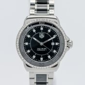 Tag Heuer, a ladies Formula 1 diamond dot and bezel date wristwatch, model number WAH1312, serial