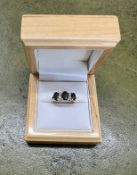 An 18ct yellow gold diamond and sapphire cluster ring, size K.