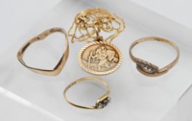 A small collection of jewellery including a 9ct gold St. Christopher on chain, 9ct gold ring, 9ct
