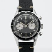 A rare Heuer Autavia Mario Andretti manual wind chronograph wristwatch, black/white subs dial, on