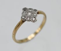 An 18ct yellow gold diamond cluster ring, size M/N.
