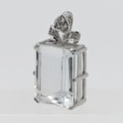 An impressive 18ct white gold pale aquamarine and diamond pendant.