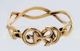 A 9ct yellow gold cuff bangle of twist rope design with centre anchor motive, approx 30g (not