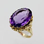 A large 14ct yellow gold amethyst ring, size L/M