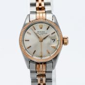 Rolex, a ladies 1966 steel and rose Oyster perpetual Date wristwatch, silver baton dial, original