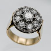 A diamond set cluster ring, round stud claw set with an open work basket head, yellow gold shank (