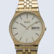 Seiko, a gents quartz date gold plated wristwatch, 369832, with spare links.