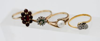 Three 9ct gold dress rings, approx 6.9g together with an 18ct yellow gold diamond twist ring, approx