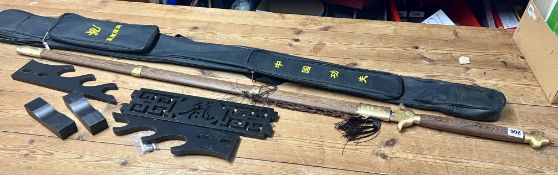 A 'Tai Chi Link' long-sword, with bag and wood display stand; scabbard and hilt are wood with