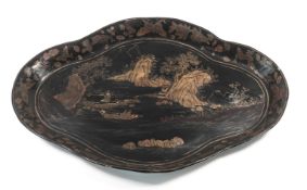 An English Papier-mâché lacquer tray, 19th century of lobed quatrefoil form, decorated in black