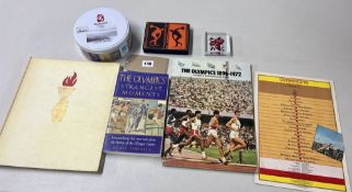 A collection of Olympic interest, books and memorabilia to include a boxed set of 'Commemorative