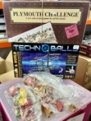 A collection of a board game, puppets and a construction set, to include 'Plymouth Challenge' by the