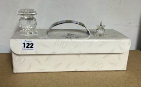 Swarovski Crystal Glass, a collection of three items, 'miniature candle holder', 'glass stand', '