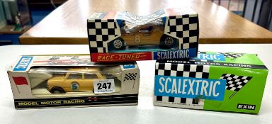 Scalextric 3 boxed models, including Tri-ang Mini, Race-tuned model, etc.