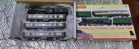 A collection of model houses, model locomotives and accessories, makes from Hornby, Bachmann, etc.