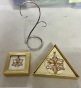 Swarovski Crystal Glass, 'Snowflake ornament and stand' '2014 snowflake', boxed.