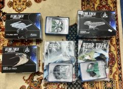 A collection of 'Star Trek Discovery: The Official Starships Collection' boxed models, 2 with