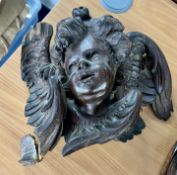 19th carved oak wall plaque, winged cherub (damaged), height 28cm.