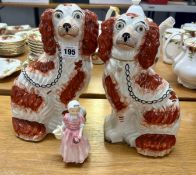 A pair of Staffordshire flat back Spaniel dogs (approx. 26cm in height) and a Royal Doulton '