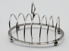 A modern Mappin and Webb silver six division toast rack approx 3.42ounces.