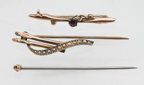 A vintage seed pearl and yellow metal brooch, a 9 carat gold and red stone brooch and part tie pin.