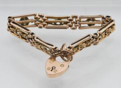 A 9 carat gold gate bracelet, approx 18.9g.