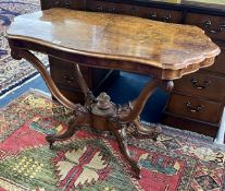 Victorian walnut occasional table, width 106cm.