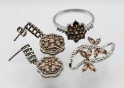 Gemporia, a set of Gouveia Andalusite silver jewellery comprising earrings, ring and pendant, all