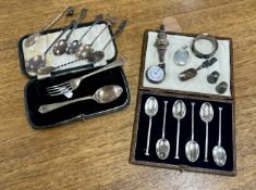 A mixed collection of silver, to include a cased 6 teaspoon set, a fob watch, a locket with