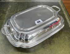 A Geo V silver entrée dish, marked EV for E. Viner, Sheffield, two parts, approx 39.70oz.