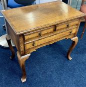 An Oak Lowboy (approx. 76 x 46 x 71cm), front features 3 drawers, drop pull handles. Top two drawers