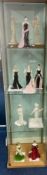 A collection of ten female statues, makes from Coalport, Royal Worcester, and A. Balcari. Statues to