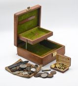 A leather cased jewellery box containing a vintage silver cased ladies wristwatch with 'red 12'