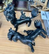 A pair of Chinese bronze mythological standing dragons, censor (faults- one leg detached). Length