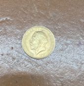 A George V full gold sovereign, dated 1912.
