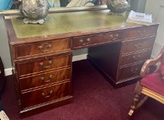 A reproduction mahogany pedestal desk, width 160cm.