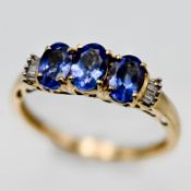 An 18ct diamond and tanzanite ring, size O/P.