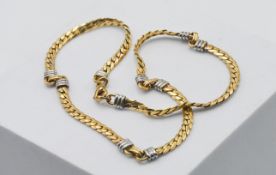 A 9ct two-toned gold herringbone necklace, approx 40cm long, approx 20.80g.