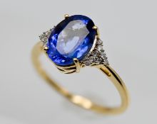 An 18ct diamond and sapphire ring, size O.
