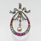 A fine Edwardian ruby and diamond pendant set in yellow gold.