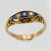 An antique 18ct sapphire and diamond ring, size L.