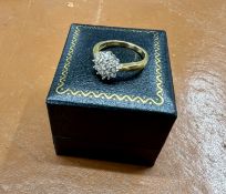 An 18ct diamond cluster ring, approx 4.5g, size P.