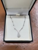 An 18ct white gold and diamond set necklace, approx 12.2g.