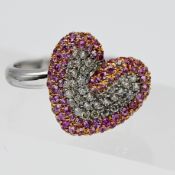 An 18ct diamond and pink sapphire 'heart' cluster ring, size O.